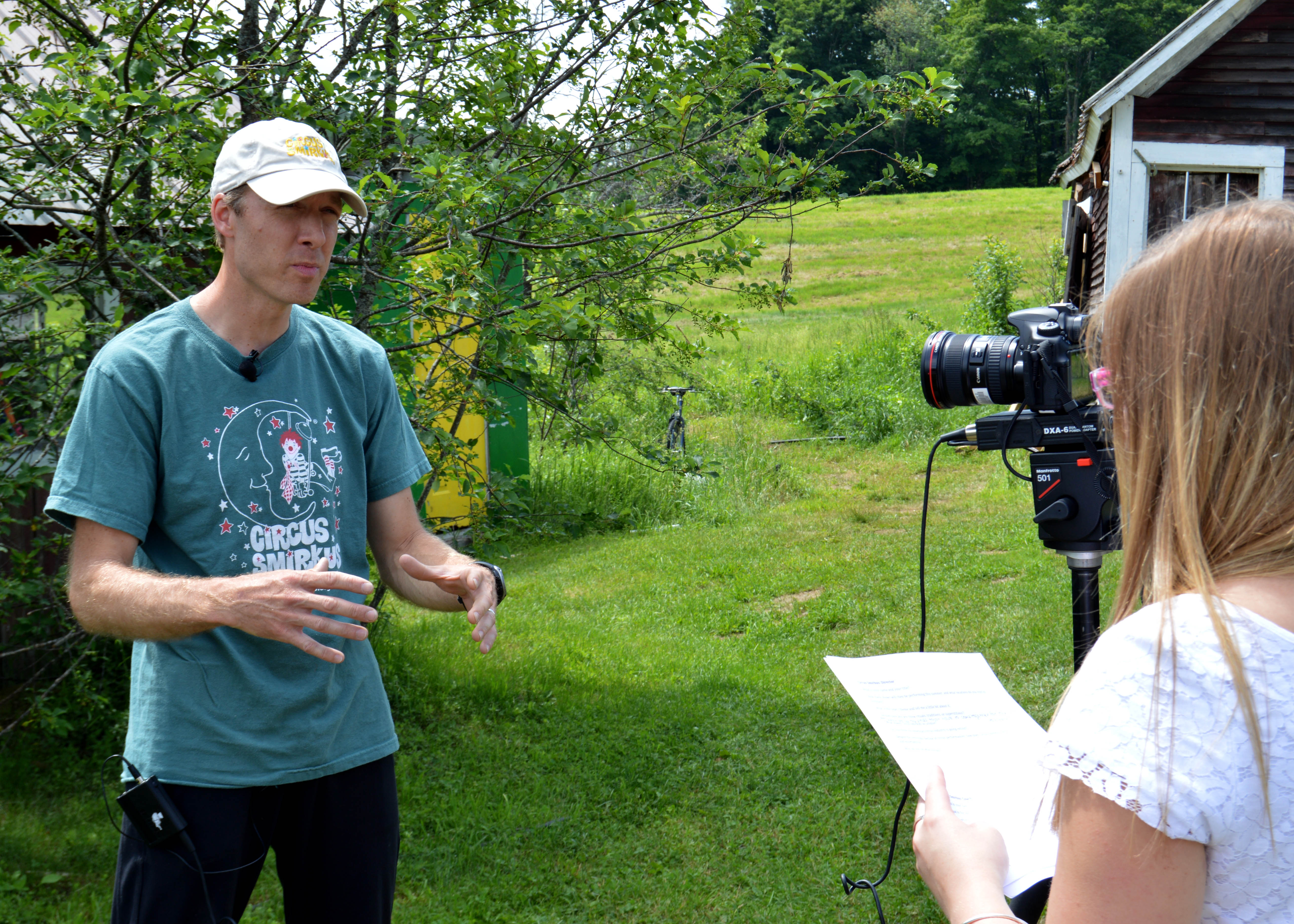 Times Argus reporter Alyson Campbell interviewing Tour Director Troy Wunderle.