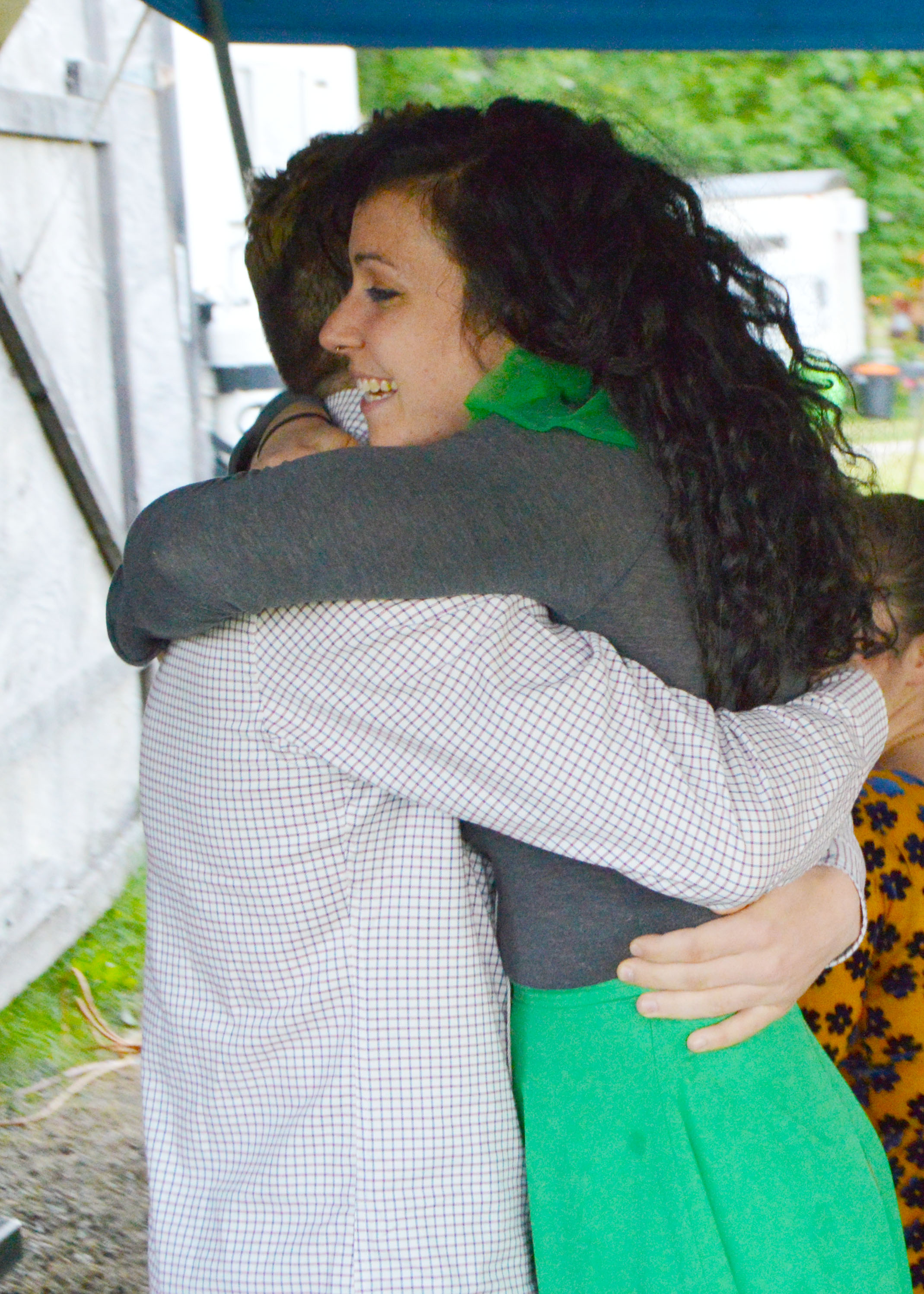 Trouper Owen Fairchild and Coach Eve Diamond hug after a heartfelt thank you.