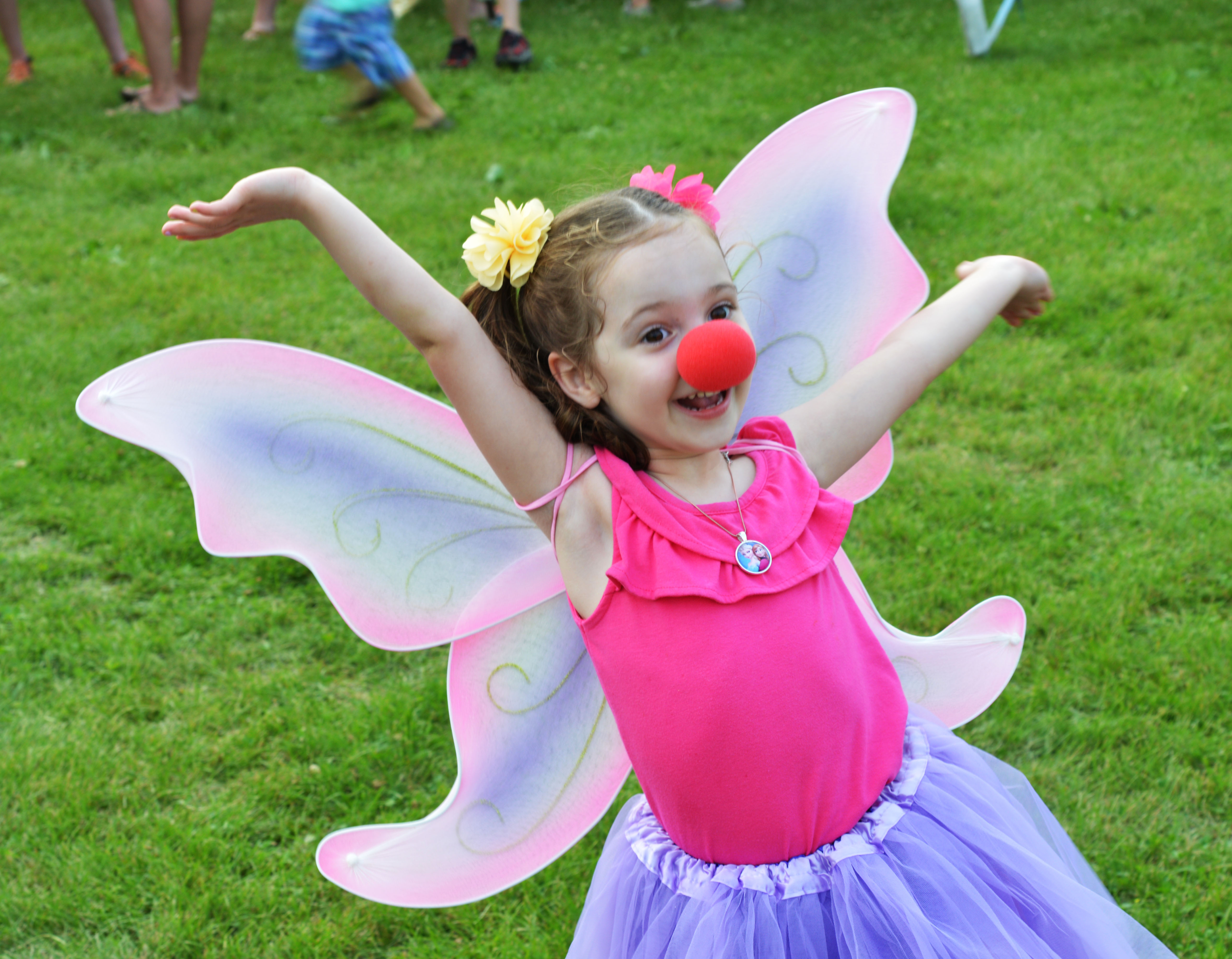 A fairy princess clown spreading some Smirkus spirit as patrons wait to enter the Big Top, July 5, 2015.