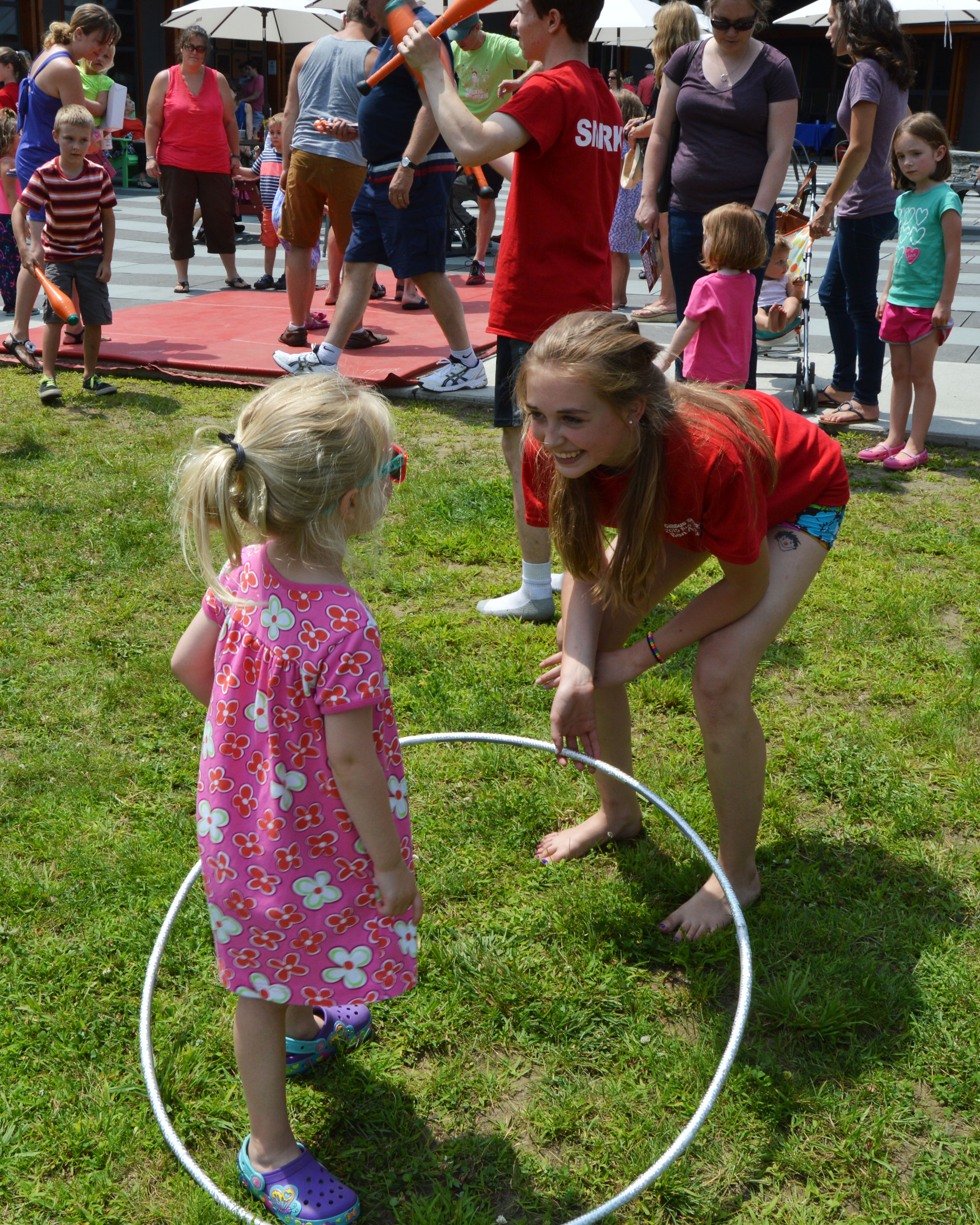 Emily Wunderle teaching hula hooping at King Arthur Flour Bakery in Norwich, VT.